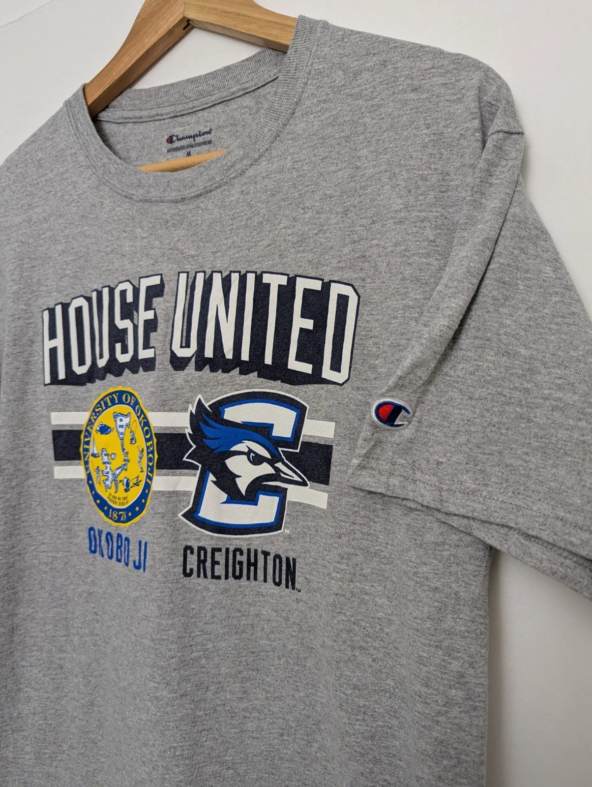 Champion “house United” University Of Okoboji X Creighton Tee – Grey – Size M